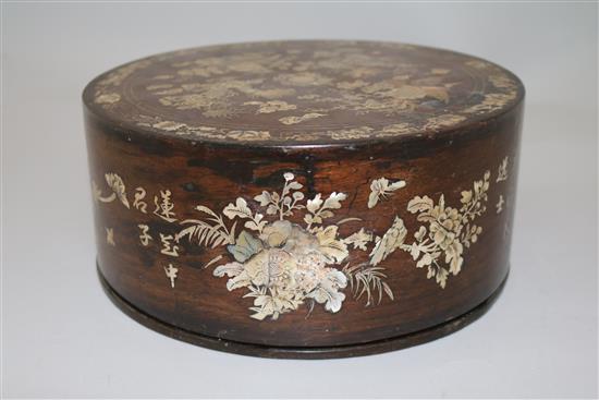 An early 20th century Chinese rosewood and mother of pearl inlaid circular box and cover, diameter 10in.